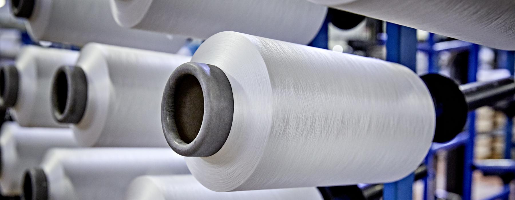 Image of large rolls with synthetic fibres at Trevira
